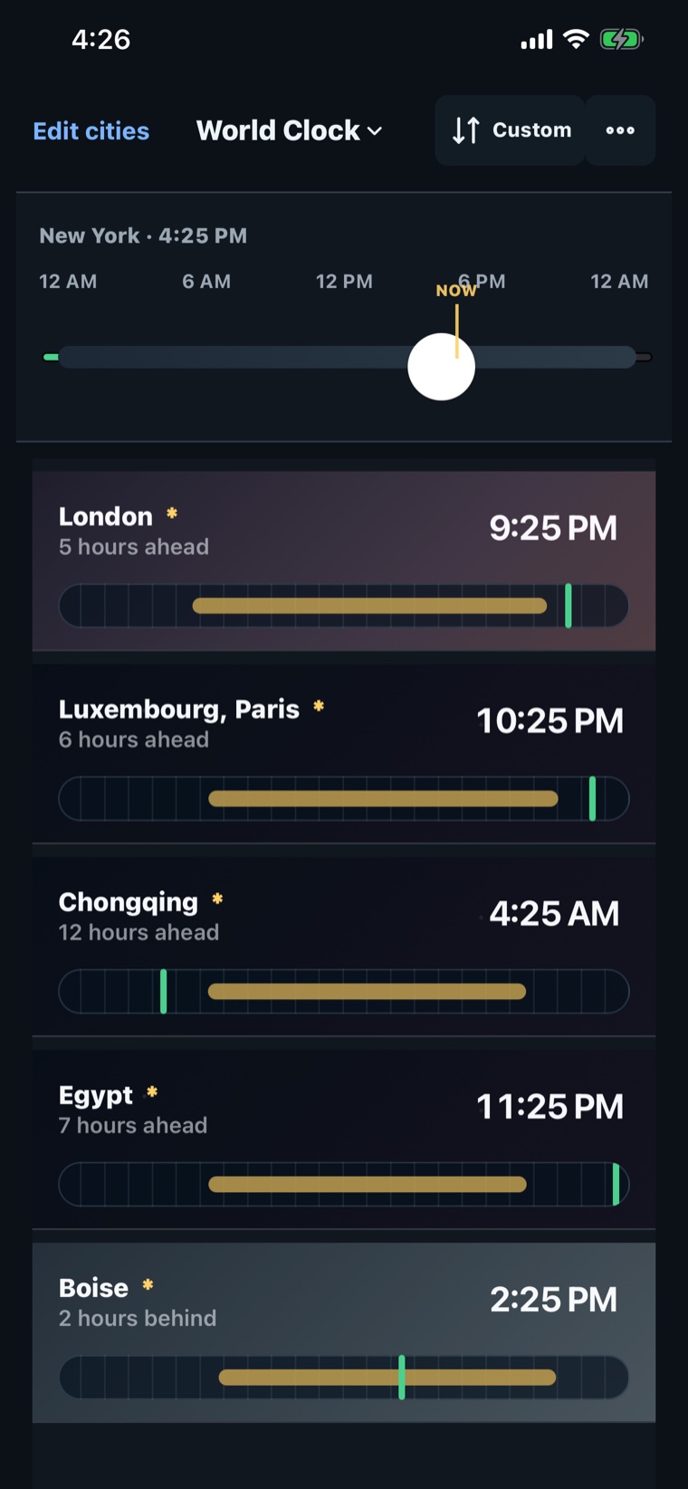 The app in dark mode, with city rows tinted by each city's local time of day